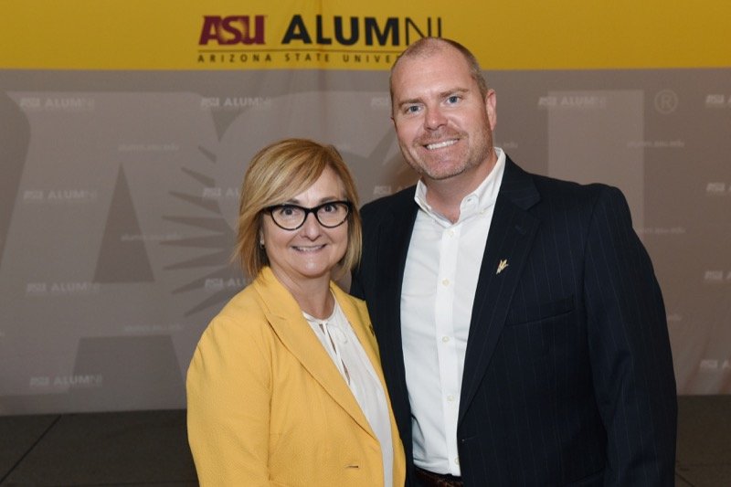 Eric Olsen with W.P. School of Business Dean Amy Hillman.